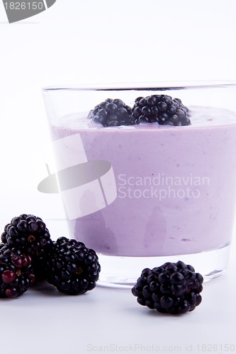 Image of fresh tasty blackberry yoghurt shake dessert isolated