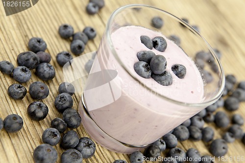 Image of fresh delicious blueberry yoghurt shake dessert on table