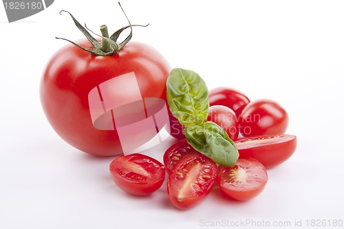Image of fresh red tomatoes with balsamic and oilve oil isolated