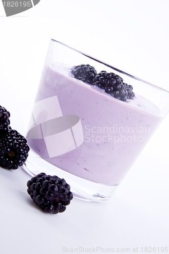 Image of fresh tasty blackberry yoghurt shake dessert isolated