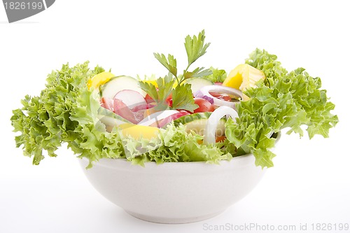 Image of fresh tasty mixed salad with different vegetables isolated