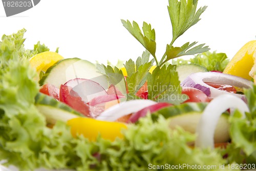 Image of fresh tasty mixed salad with different vegetables isolated