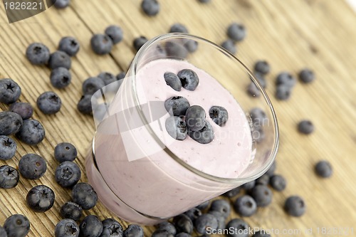 Image of fresh delicious blueberry yoghurt shake dessert on table