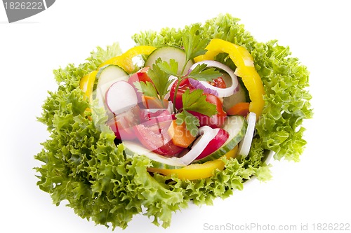 Image of fresh tasty mixed salad with different vegetables isolated