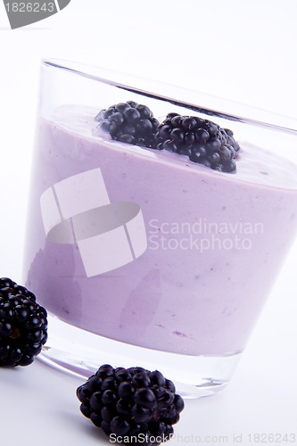 Image of fresh tasty blackberry yoghurt shake dessert isolated