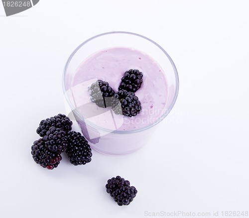 Image of fresh tasty blackberry yoghurt shake dessert isolated
