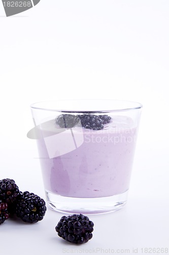 Image of fresh tasty blackberry yoghurt shake dessert isolated