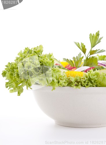 Image of fresh tasty mixed salad with different vegetables isolated