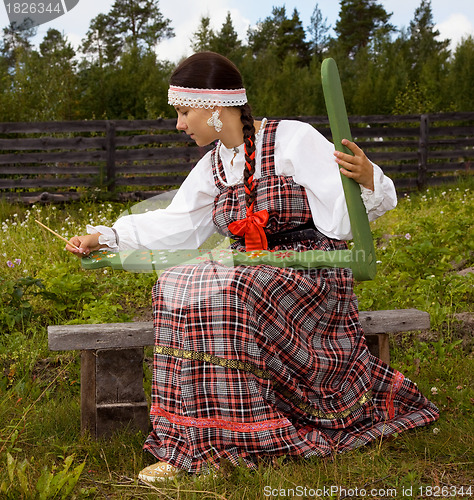 Image of Portrait young  girl in national costume 