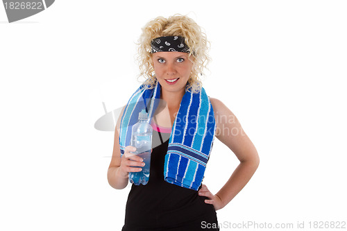 Image of Fitness woman drinking water