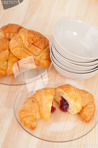 Image of croissant French brioche filled with berries jam