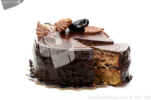 Image of Chocolate cake with walnuts and prunes.