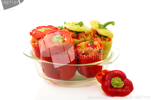 Image of Sweet pepper with vegetable stuffing in a pan for baking.
