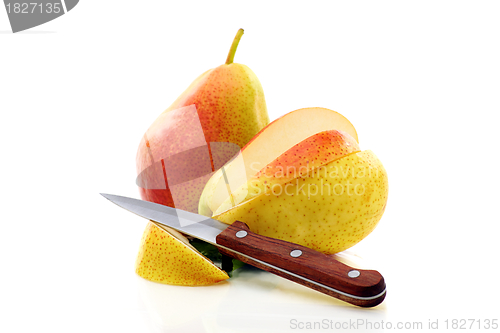 Image of Two ripe pears and knife.