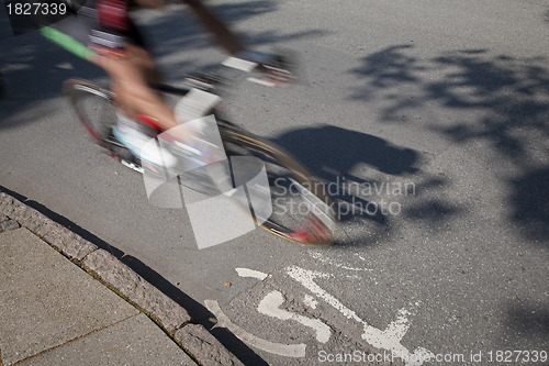 Image of Speedy cyclist in finish