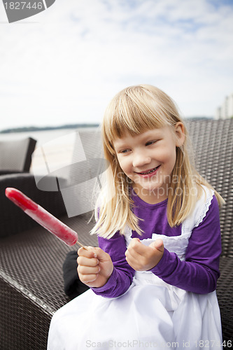 Image of Girl with popsicle