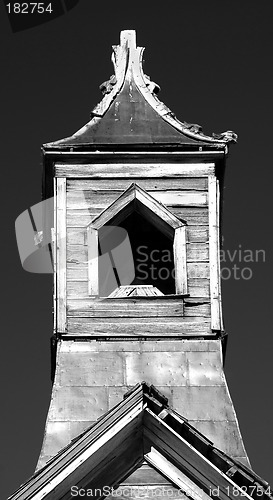 Image of Old wooden church steeple in black and white