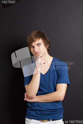 Image of Young man thinking