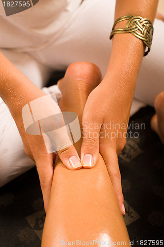 Image of Massaging a thigh
