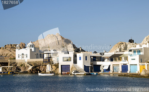 Image of fisherman houses built into rock cliffs  Mediterranean Sea Firop