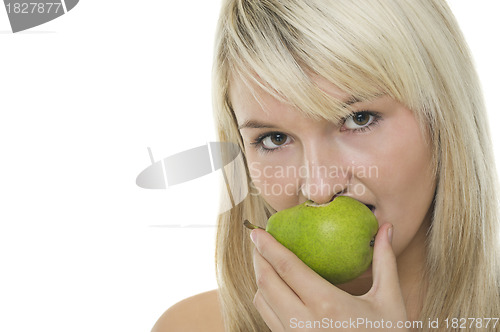 Image of Woman with half eaten pear