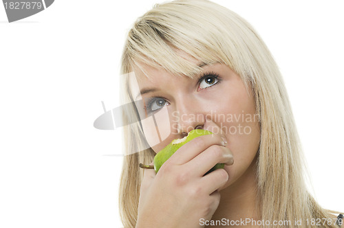 Image of Woman munching on a green apple