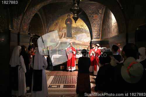 Image of Catholic Mass at the 11th Stations of the Cross in the Church of the Holy Sepulchre