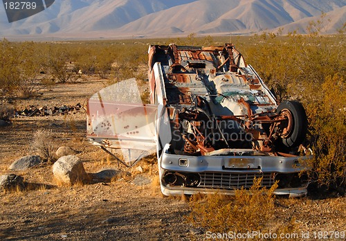 Image of Deserted wrecked car in the desert