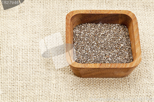 Image of chia seeds in wood bowl