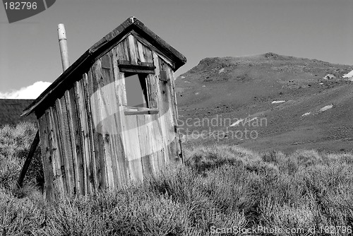 Image of Black and white image of an old deserted shack in deserted Calif