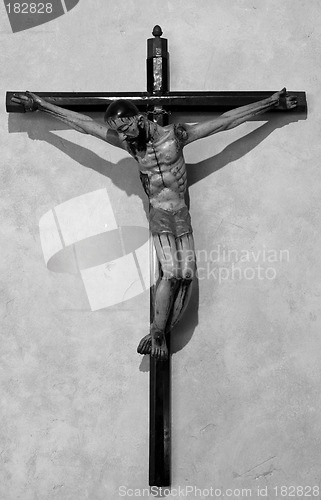 Image of Black and white image of Christ on a cross in old mission