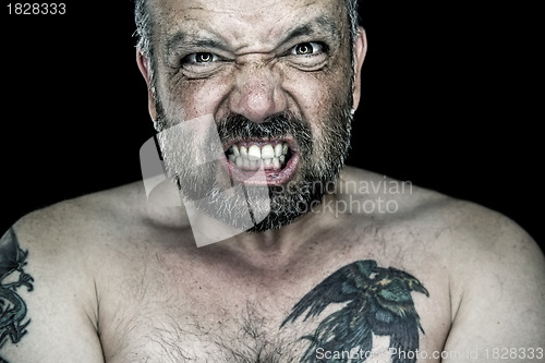 Image of angry man with beard