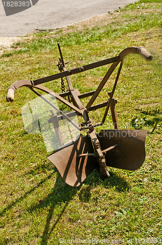 Image of antique agriculture machine plough