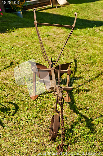 Image of antique agriculture machine plough