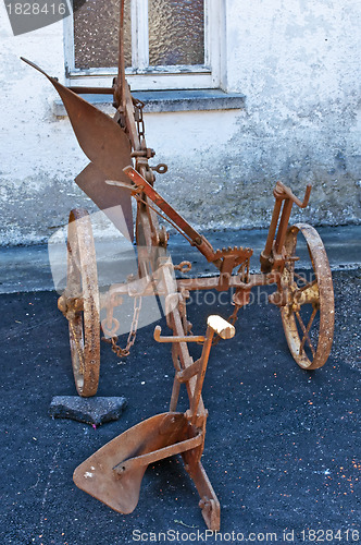 Image of antique agriculture machine plough