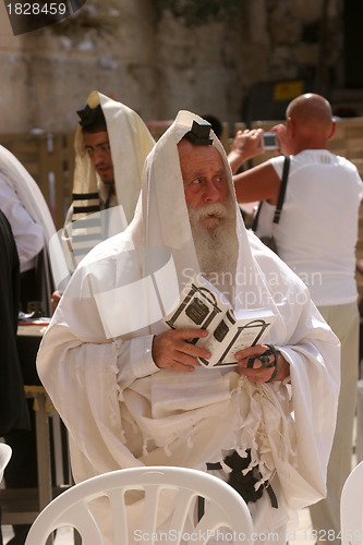 Image of Jerusalem, Jewish men pray at the western wall