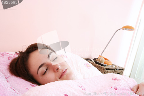 Image of Beautiful young woman sleeping.