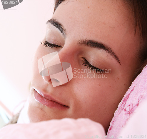 Image of Beautiful young woman sleeping.