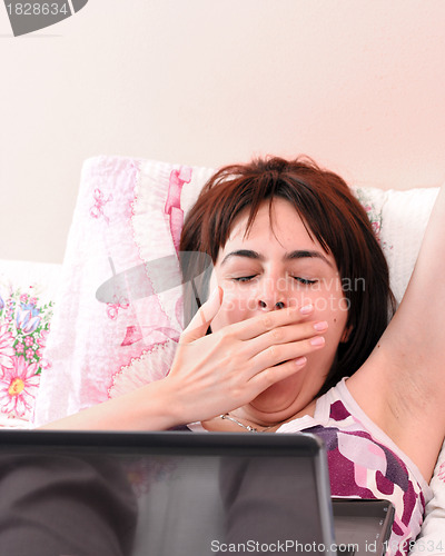 Image of Young woman with laptop 