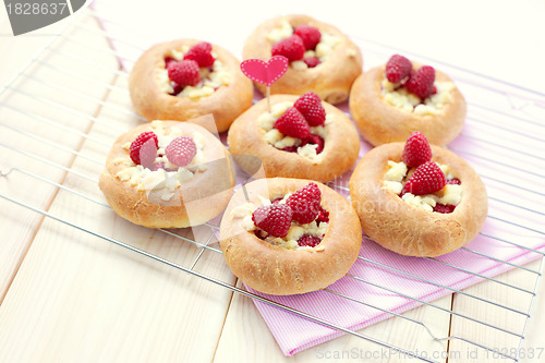 Image of buns with raspberries