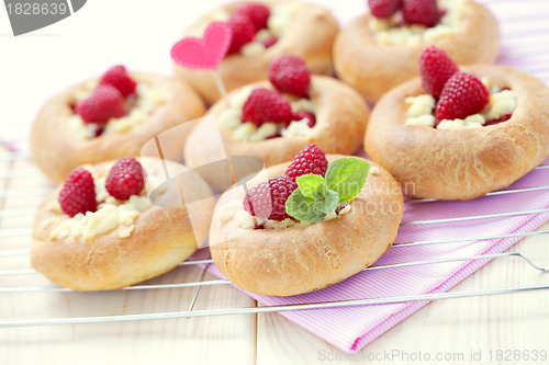 Image of buns with raspberries