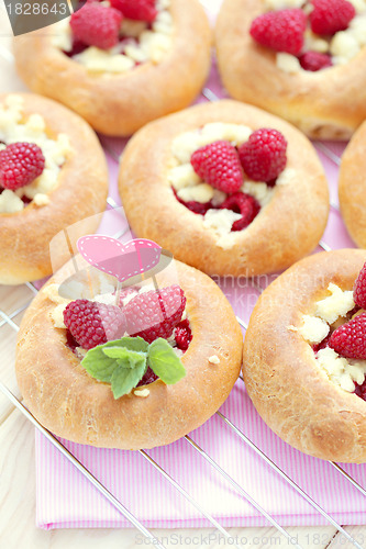 Image of buns with raspberries