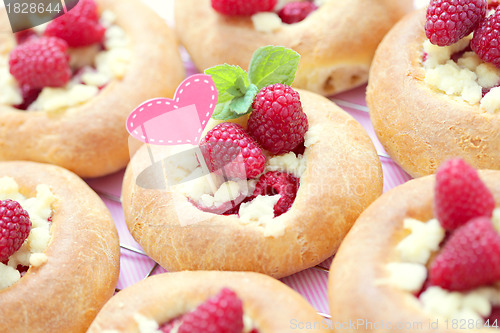 Image of buns with raspberries