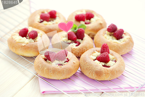 Image of buns with raspberries