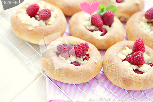 Image of buns with raspberries