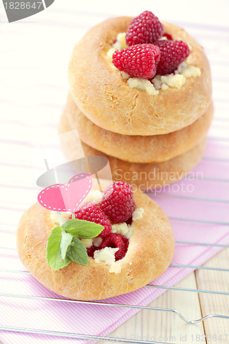 Image of buns with raspberries
