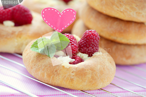 Image of buns with raspberries