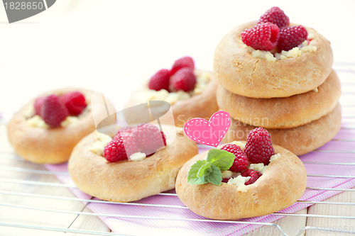 Image of buns with raspberries