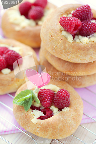 Image of buns with raspberries