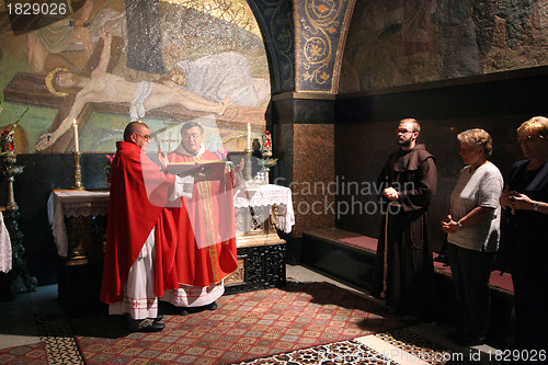 Image of Catholic Mass at the 11th Stations of the Cross in the Church of the Holy Sepulchre. Jerusalem